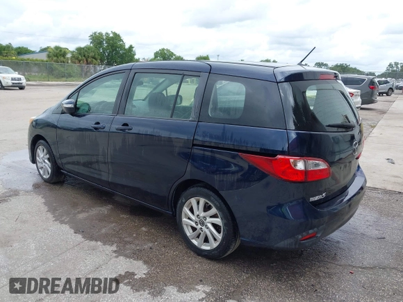 2014 Mazda 5 Sport with VIN JM1CW2BL6E0169672, listed as a IAAI auction lot 42422459 with 212,179 mi miles and . Bid and sale history available at DreamBid. Image 3.