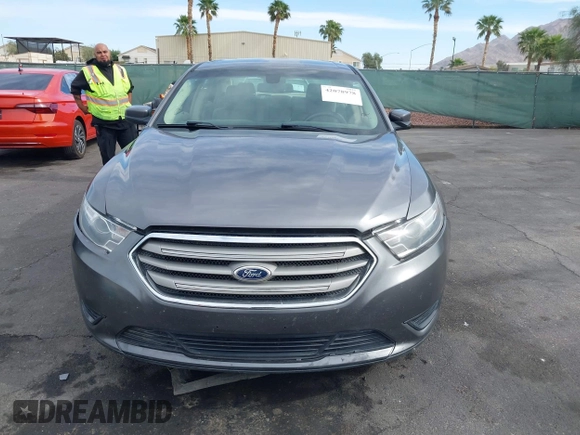 2013 Ford Taurus SEL with VIN 1FAHP2E82DG230831, listed as a IAAI auction lot 42078978 with 207,075 mi miles and . Bid and sale history available at carsss.com. Image 13.