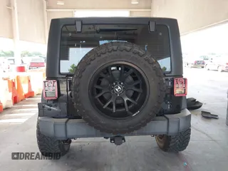 2018 Jeep Wrangler Sport S with VIN 1C4GJWAG3JL927925, listed as a IAAI auction lot 42387748 with 48,447 mi miles and . Bid and sale history available at DreamBid. Image 16.