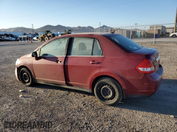 2009 Nissan Versa 1.8 S with VIN 3N1BC11E39L363606, listed as a Copart auction lot 65594774 with 110,191 mi miles and Salvage Title. Bid and sale history available at carsss.com. Image 2.