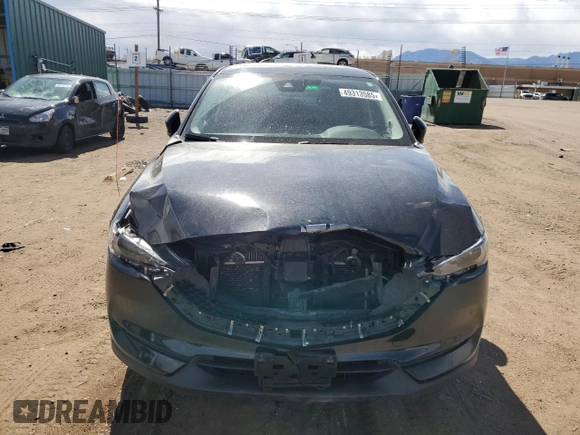 2020 Mazda CX-5 Grand Touring with VIN JM3KFBDMXL1735154, listed as a Copart auction lot 49313585 with 82,750 mi miles and Salvage Title. Bid and sale history available at DreamBid. Image 5.