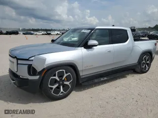 2023 Rivian R1T Adventure with VIN 7FCTGAAA1PN020612, listed as a Copart auction lot 72971044 with 7,858 mi miles and Salvage Title. Bid and sale history available at carsss.com. Image 1.