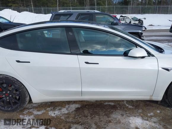 2020 Tesla Model 3 Standard Range Plus with VIN 5YJ3E1EA7LF742973, listed as a IAAI auction lot 41409285 with 48,993 mi miles and . Bid and sale history available at DreamBid. Image 13.