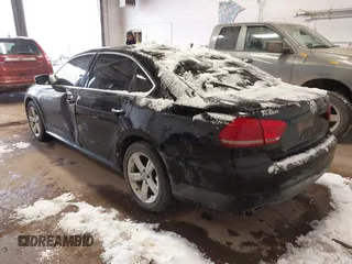 2013 Volkswagen Passat TDI SE with VIN 1VWBN7A39DC003511, listed as a IAAI auction lot 41469644 with 167,962 mi miles. Bid and sale history available at carsss.com. Image 3.