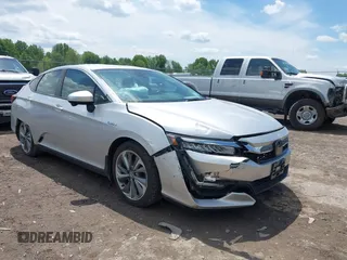 2018 Honda Clarity z VIN JHMZC5F14JC007026, wystawiony jako IAAI lot #42361556 z przebiegiem 74 132 mil mil oraz . Historia ofert i sprzedaży dostępna na DreamBid. Obrazek 1.