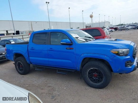 2019 Toyota Tacoma 4WD SR with VIN 5TFCZ5AN0KX199524, listed as a IAAI auction lot 41230720 with 91,183 mi miles. Bid and sale history available at carsss.com. Image 14.