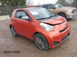 2012 Scion iQ z VIN JTNJJXB07CJ011286, wystawiony jako IAAI lot #40937713 z przebiegiem 103 876 mil mil oraz . Historia ofert i sprzedaży dostępna na DreamBid. Obrazek 1.