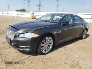 2015 Jaguar XJ Portfolio with VIN SAJWJ2GD4F8V83521, listed as a Copart auction lot 60898585 with 68,659 mi miles and Salvage title. Bid and sale history available at DreamBid. Image 1.