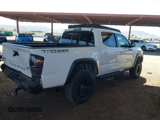 2016 Toyota Tacoma SR with VIN 5TFCZ5ANXGX028464, listed as a IAAI auction lot 41834385 with 124,407 mi miles and . Bid and sale history available at DreamBid. Image 4.