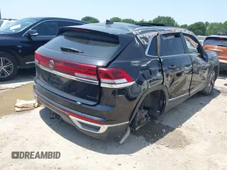 2024 Volkswagen Atlas SEL with VIN 1V2BE2CA3RC233021, listed as a IAAI auction lot 42185251 with 23,398 mi miles and . Bid and sale history available at DreamBid. Image 4.