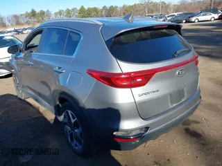 2021 Kia Sportage EX with VIN KNDPNCAC8M7854533, listed as a IAAI auction lot 41757662 with 25,051 mi miles and . Bid and sale history available at DreamBid. Image 3.