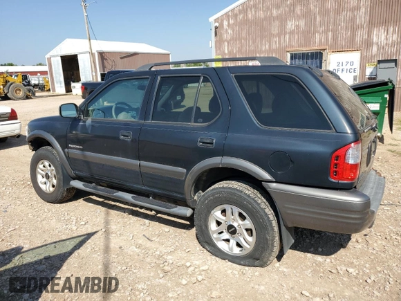 2003 Isuzu Rodeo with VIN 4S2CK58W634313617, listed as a Copart auction lot 70144664 with 179,921 mi miles and Clean Title. Bid and sale history available at DreamBid. Image 2.
