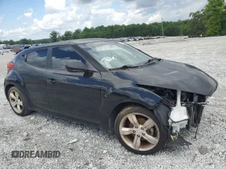 2014 Hyundai Veloster z VIN KMHTC6AD3EU198500, wystawiony jako Copart lot #56943915 z przebiegiem 118 173 mil mil oraz Tytuł czysty. Historia ofert i sprzedaży dostępna na DreamBid. Obrazek 4.
