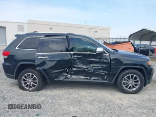 2014 Jeep Grand Cherokee Limited with VIN 1C4RJEBG6EC528840, listed as a IAAI auction lot 42107197 with 186,656 mi miles and . Bid and sale history available at DreamBid. Image 13.