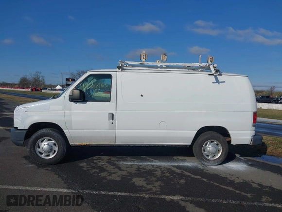 2013 Ford Econoline Cargo Commercial with VIN 1FTNE2EL1DDB27599, listed as a IAAI auction lot 41878865 with 179,802 mi miles and . Bid and sale history available at DreamBid. Image 14.