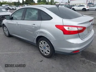 2012 Ford Focus SE with VIN 1FAHP3F27CL257447, listed as a IAAI auction lot 42180626 with 130,155 mi miles. Bid and sale history available at carsss.com. Image 3.