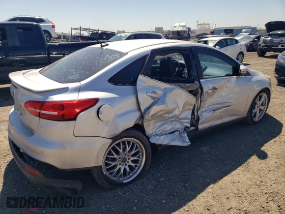 2015 Ford Focus Titanium with VIN 1FADP3J2XFL334046, listed as a Copart auction lot 48538825 with 98,322 mi miles and Non Repairable. Bid and sale history available at carsss.com. Image 3.