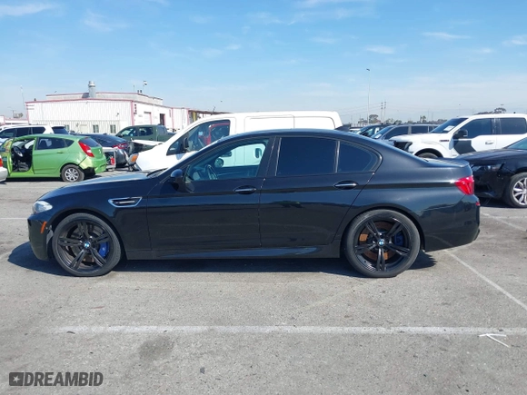 2013 BMW M5 with VIN WBSFV9C54DC772568, listed as a IAAI auction lot 41866486 with 99,072 mi miles. Bid and sale history available at carsss.com. Image 14.