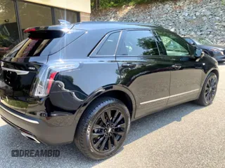 2021 Cadillac XT5 AWD Sport with VIN 1GYKNHRS7MZ16XXX, listed as a Copart auction lot 61952565 with 93,253 mi miles and Clean title. Bid and sale history available at DreamBid. Image 4.