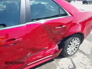 2013 Cadillac CTS Luxury with VIN 1G6DE5E55D0157455, listed as a IAAI auction lot 42469959 with 107,274 mi miles and . Bid and sale history available at DreamBid. Image 6.