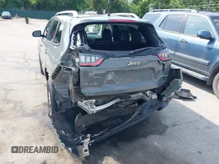 2020 Jeep Cherokee Latitude Plus with VIN 1C4PJMLB0LD651125, listed as a IAAI auction lot 42480253 with 105,649 mi miles and . Bid and sale history available at DreamBid. Image 6.
