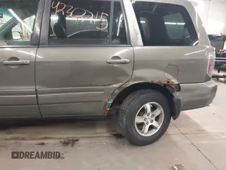 2007 Honda Pilot EX-L z VIN 2HKYF185X7H505077, wystawiony jako IAAI lot #42362215 z przebiegiem 174 592 mil mil oraz . Historia ofert i sprzedaży dostępna na DreamBid. Obrazek 6.