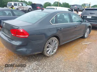 2014 Volkswagen Passat SE z VIN 1VWBT7A39EC097705, wystawiony jako IAAI lot #42447661 z przebiegiem 72 607 mil mil oraz . Historia ofert i sprzedaży dostępna na DreamBid. Obrazek 4.