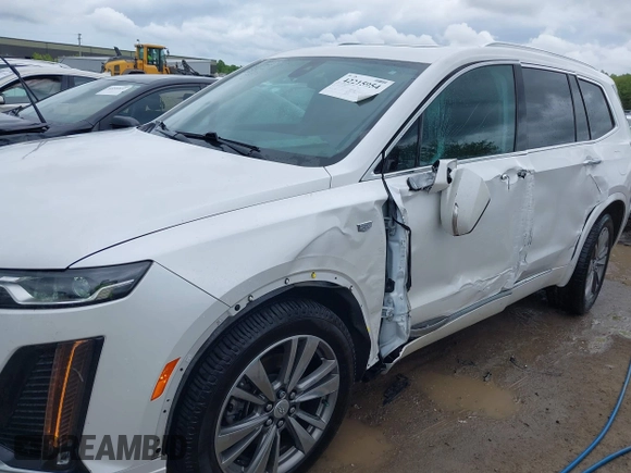 2021 Cadillac XT6 Premium Luxury z VIN 1GYKPDRS0MZ141453, wystawiony jako IAAI lot #42215954 z przebiegiem 144 245 mil mil oraz . Historia ofert i sprzedaży dostępna na DreamBid. Obrazek 6.