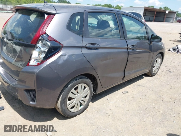 2015 Honda Fit LX with VIN 3HGGK5G57FM747786, listed as a IAAI auction lot 42656703 with 102,637 mi miles and . Bid and sale history available at DreamBid. Image 4.