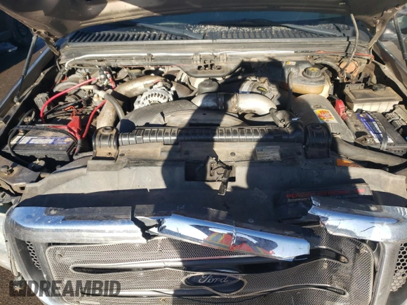 2004 Ford F-350 XL z VIN 1FTSW31P74EB59689, wystawiony jako Copart lot #87101184 z przebiegiem 240 134 mil mil oraz Szkoda całkowita • Salvage title. Historia ofert i sprzedaży dostępna na DreamBid. Obrazek 11.