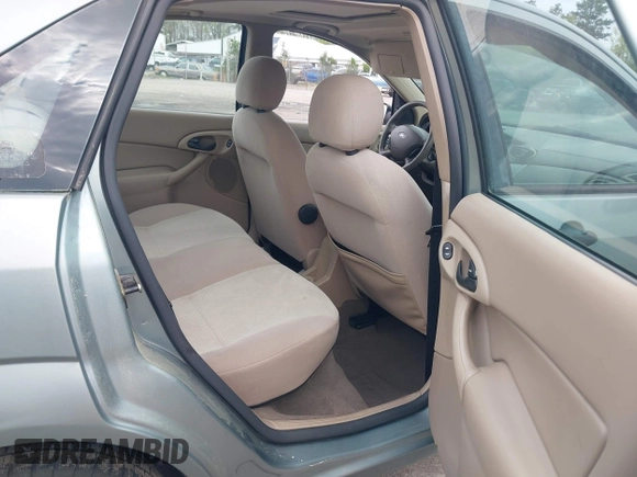 2004 Ford Focus ZTS with VIN 1FAFP38Z74W117402, listed as a IAAI auction lot 42035928 with 113,393 mi miles and . Bid and sale history available at carsss.com. Image 8.