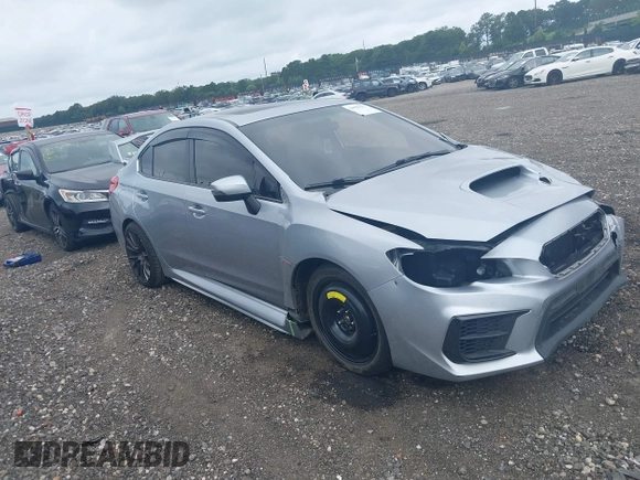 2020 Subaru WRX STI Limited with VIN JF1VA2Y6XL9806022, listed as a IAAI auction lot 39980273 with 143,889 mi miles. Bid and sale history available at carsss.com. Image 1.
