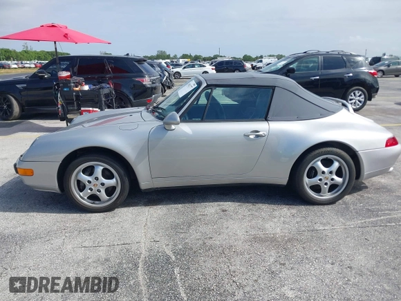 1998 Porsche 911 Carrera with VIN WP0CA2992WS340996, listed as a IAAI auction lot 42002177 with 47,222 mi miles. Bid and sale history available at carsss.com. Image 14.
