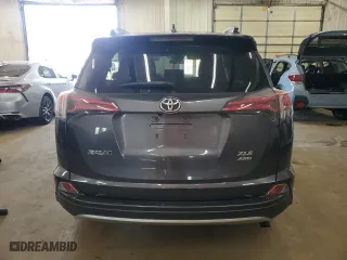2018 Toyota RAV4 XLE with VIN JTMRFREV1JJ736777, listed as a Copart auction lot 52329605 with 60,069 mi miles and Salvage Title. Bid and sale history available at carsss.com. Image 6.