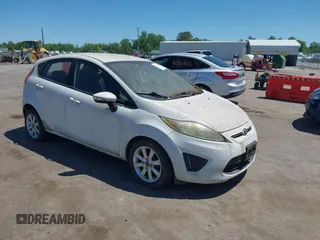 2013 Ford Fiesta SE with VIN 3FADP4EJ0DM109816, listed as a IAAI auction lot 42119360 with 164,397 mi miles. Bid and sale history available at carsss.com. Image 1.