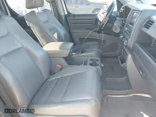 2010 Honda Ridgeline RTL with VIN 5FPYK1F54AB011339, listed as a IAAI auction lot 41983918 with 201,124 mi miles. Bid and sale history available at carsss.com. Image 5.