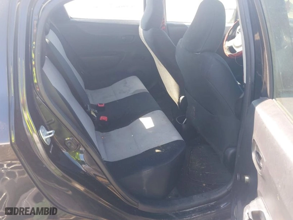 2012 Toyota Yaris L with VIN JTDKTUD33CD504907, listed as a IAAI auction lot 41587510 with 242,307 mi miles. Bid and sale history available at carsss.com. Image 8.