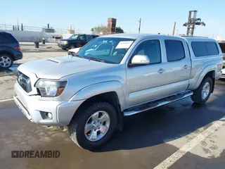 2013 Toyota Tacoma PreRunner with VIN 3TMKU4HN8DM034338, listed as a IAAI auction lot 41808842 with 142,012 mi miles and . Bid and sale history available at DreamBid. Image 18.
