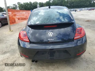 2016 Volkswagen Beetle Wolfsburg Edition with VIN 3VWF17AT8GM637442, listed as a Copart auction lot 55034595 with 137,211 mi miles and Salvage Title. Bid and sale history available at DreamBid. Image 6.