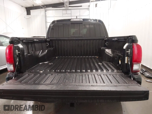2019 Toyota Tacoma SR with VIN 5TFCZ5AN7KX167511, listed as a IAAI auction lot 42360585 with 65,213 mi miles and . Bid and sale history available at DreamBid. Image 18.