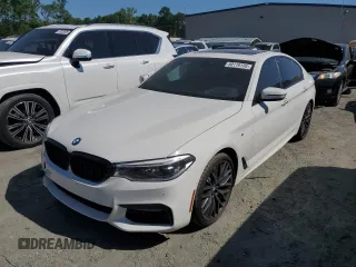 2018 BMW 5 Series 540i xDrive with VIN WBAJE7C52JG891212, listed as a Copart auction lot 58119195 with 73,770 mi miles and Salvage title. Bid and sale history available at DreamBid. Image 1.