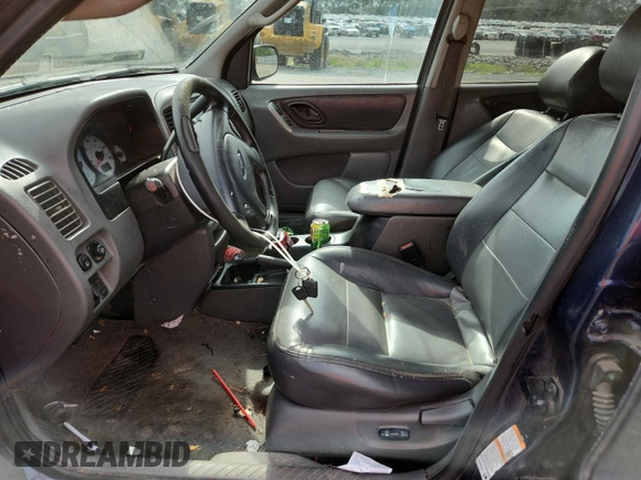 2003 Ford Escape XLT Popular with VIN 1FMCU03123KA03878, listed as a Copart auction lot 60133485 with 298,100 mi miles and Salvage title. Bid and sale history available at DreamBid. Image 7.