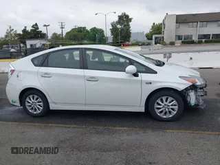 2012 Toyota Prius with VIN JTDKN3DP5C3003868, listed as a IAAI auction lot 42788584 with 148,769 mi miles and . Bid and sale history available at DreamBid. Image 14.