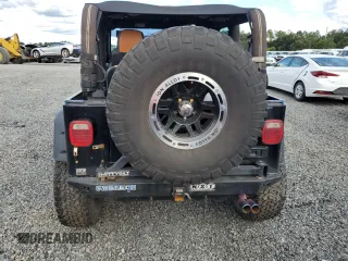2004 Jeep Wrangler Rubicon with VIN 1J4FA69S54P769356, listed as a Copart auction lot 74089914 with 0 mi miles and Salvage Title. Bid and sale history available at carsss.com. Image 6.