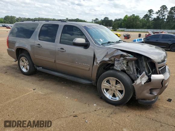 2013 Chevrolet Suburban LS z VIN 1GNSCHE00DR221307, wystawiony jako Copart lot #54684925 z przebiegiem 203 169 mil mil oraz Szkoda całkowita • Salvage title. Historia ofert i sprzedaży dostępna na DreamBid. Obrazek 4.