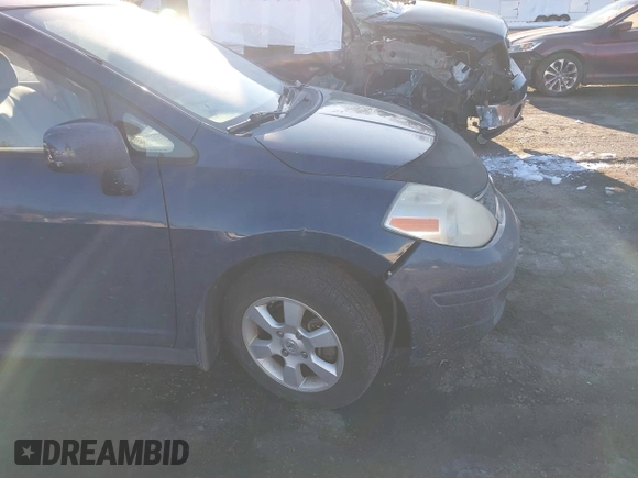 2008 Nissan Versa 1.8 S with VIN 3N1BC13E98L383015, listed as a IAAI auction lot 41599974 with 136,937 mi miles. Bid and sale history available at carsss.com. Image 6.