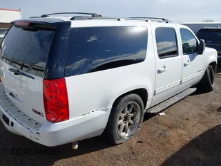 2014 GMC Yukon XL SLT with VIN 1GKS1KE00ER125405, listed as a IAAI auction lot 41609280 with 221,690 mi miles. Bid and sale history available at carsss.com. Image 4.