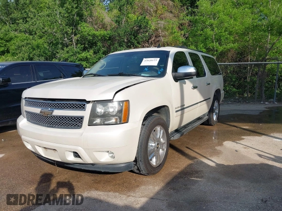 2010 Chevrolet Suburban LTZ with VIN 1GNUKKE38AR251895, listed as a IAAI auction lot 42020123 with 166,130 mi miles. Bid and sale history available at carsss.com. Image 2.