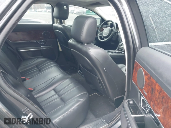 2014 Jaguar XJ with VIN SAJWA1CZ0E8V73966, listed as a IAAI auction lot 41887234 with 120,804 mi miles and . Bid and sale history available at DreamBid. Image 8.