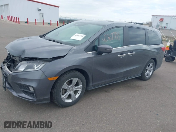 2018 Honda Odyssey EX-L z VIN 5FNRL6H72JB090127, wystawiony jako IAAI lot #42167788 z przebiegiem 114 984 mil mil oraz . Historia ofert i sprzedaży dostępna na DreamBid. Obrazek 17.
